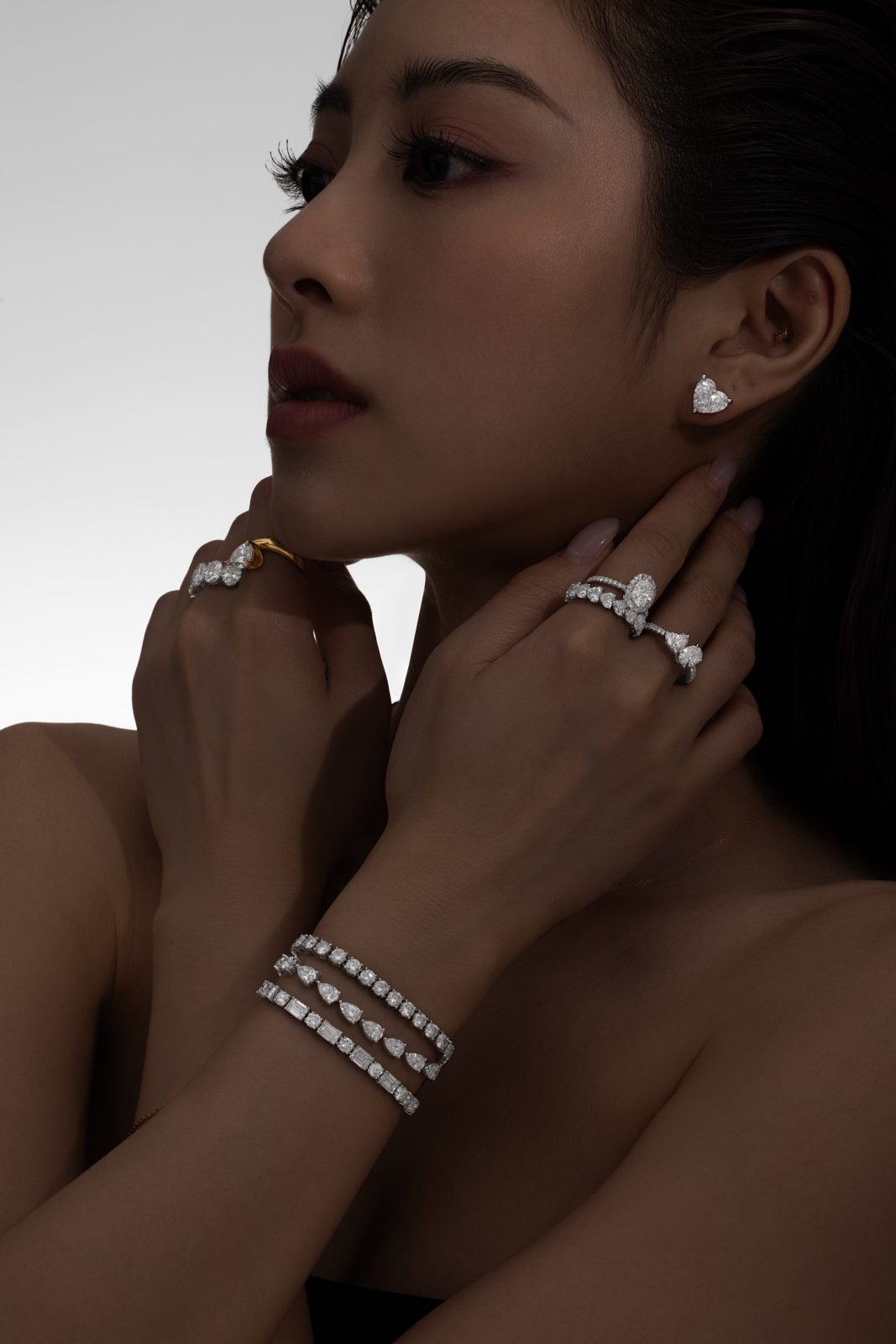 Stacked diamond rings and bracelets